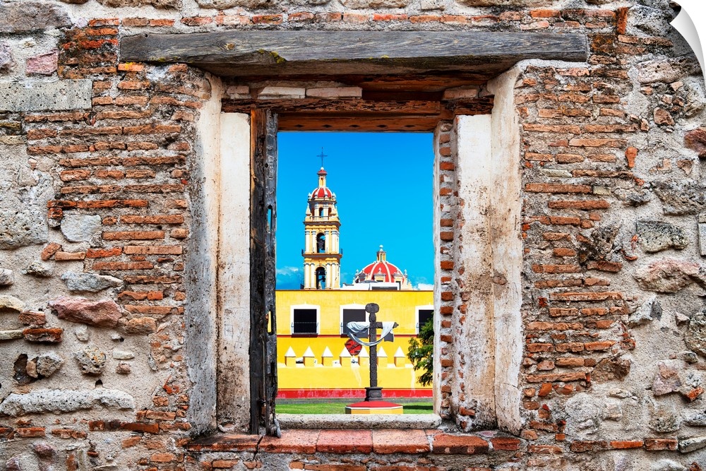 View of a Courtyard of a Church in Puebla, Mexico, framed through a stony, brick window. From the Viva Mexico Window View.