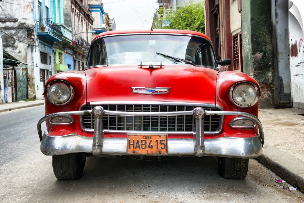 Photograph of the front of a red vintage Chevrolet.