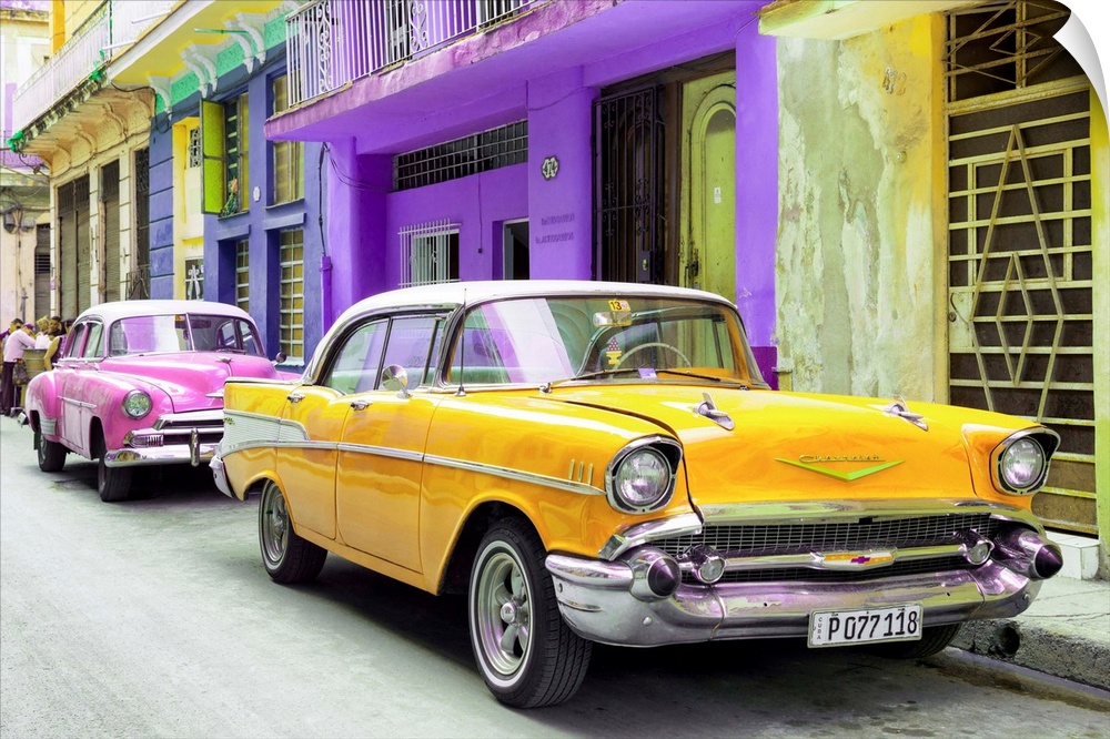 Photograph of a yellow Chevrolet parked outside of brightly colored Cuban facades.