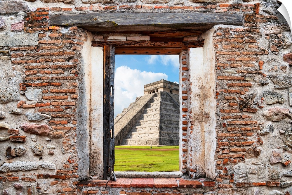 View of El Castillo Pyramid in Yucat?n, Mexico, framed through a stony, brick window. From the Viva Mexico Window View.�