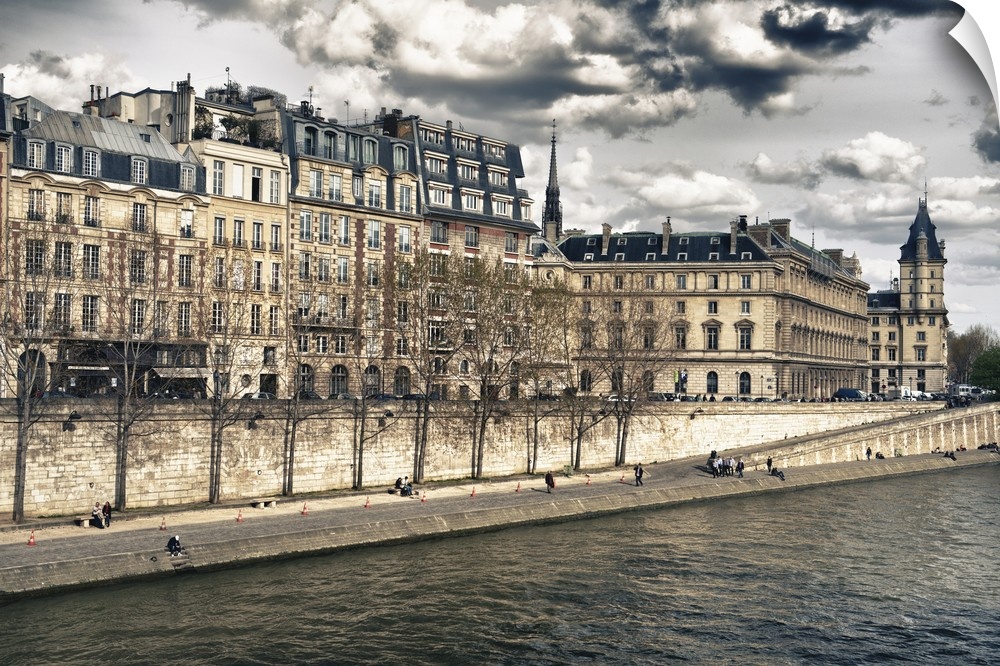 Fine art photo of the buildings in the heart of Paris, surrounded by the Seine river.