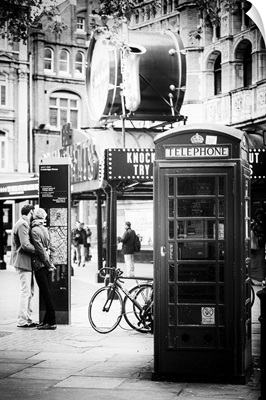 Loving Couple Kissing and Red Telephone Booth, London