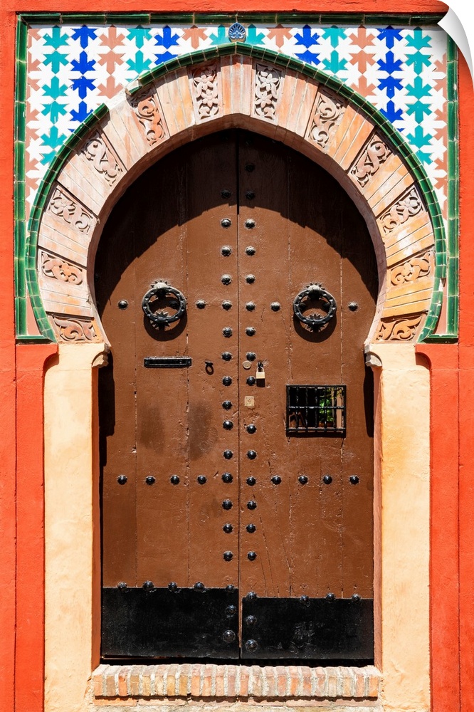 It's an old colorful wooden door arabic style in Granada, Spain.