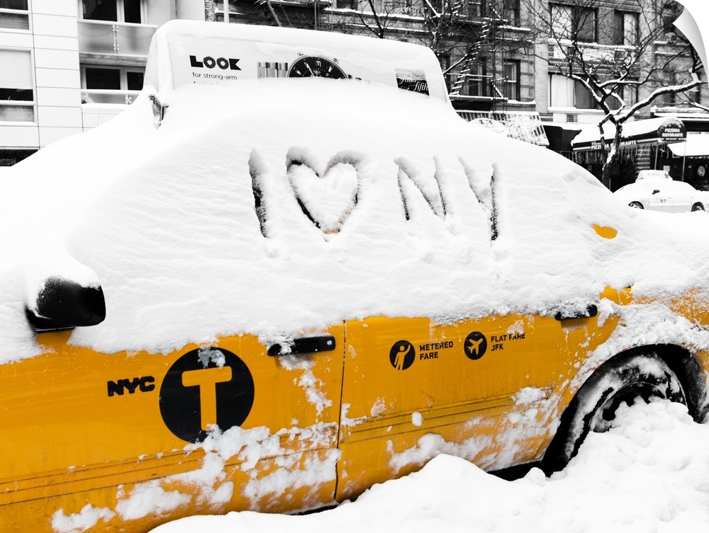 A photograph of a yellow taxi cab in Manhattan in winter.