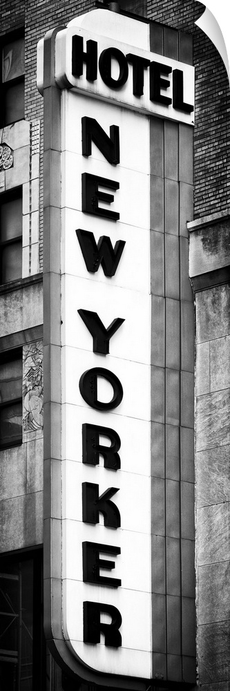Black and white photo of the vertical sign for the New Yorker hotel.