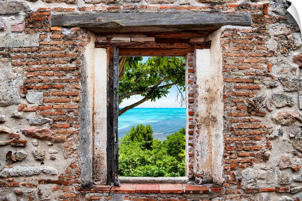 View of Isla Mujeres, Mexico, framed through a stony, brick window. From the Viva Mexico Window View.