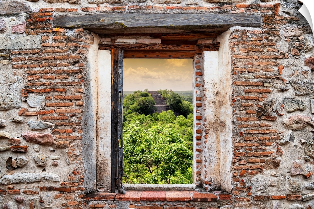 View of the Ruins of the ancient Mayan City of Calakmul, Mexico, framed through a stony, brick window. From the Viva Mexic...