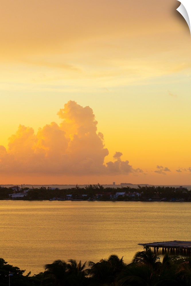 Photograph of a beautiful orange, pink, and yellow sunset over Cancun, Mexico. From the Viva Mexico Collection.