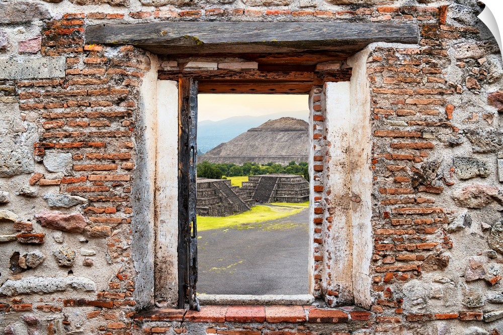 View of the Teotihuacan Pyramids framed through a stony, brick window. From the Viva Mexico Window View.