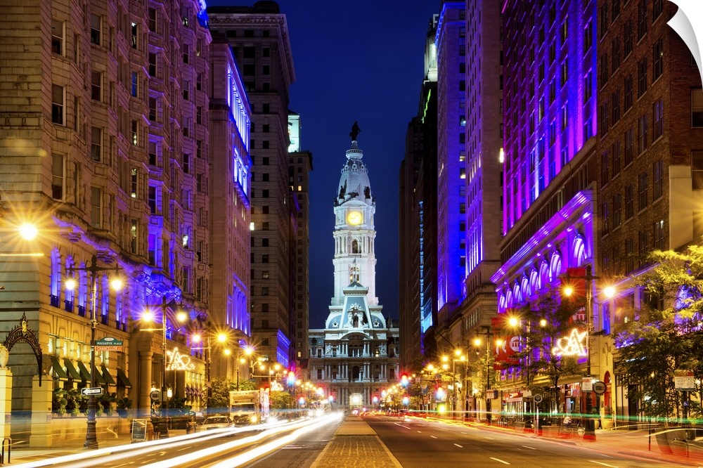 Fine art photograph of City Hall in Philadelphia in the evening, with light trails in the street.