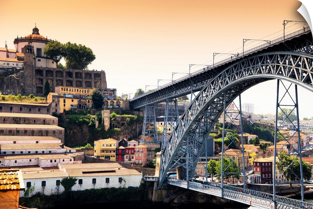 It's a landscape picture at sunset of the city of Porto (Portugal) with the Dom Luis bridge.