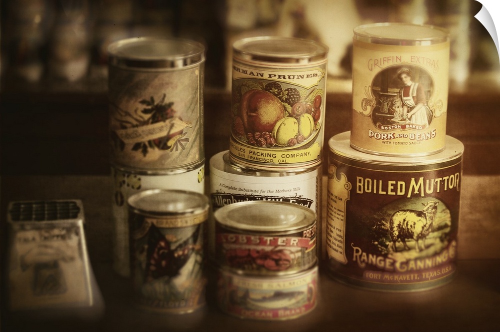 A collection of tin cans of various foodstuffs.
