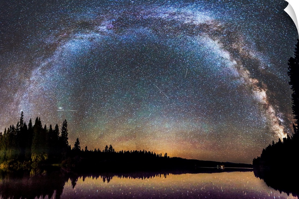 The Milky Way seen in the night sky over a lake, Oregon.