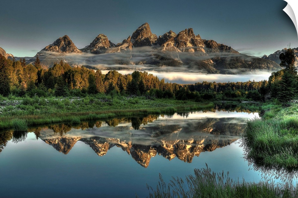 A unique morning at Schwabacher's landing, with two rows of clouds under the mountain peaks.