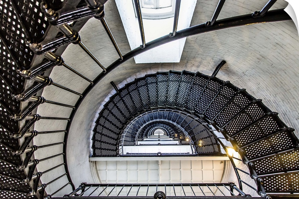 Spiral staircase in the center of a lighthouse.