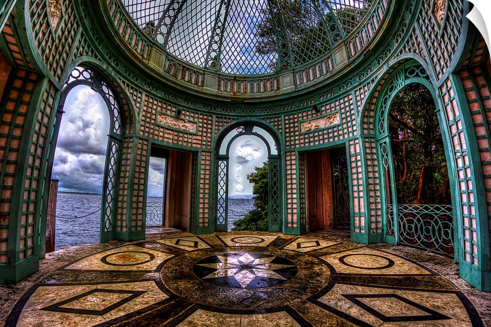 Elaborately decorated round room with patterned tiles and windows.