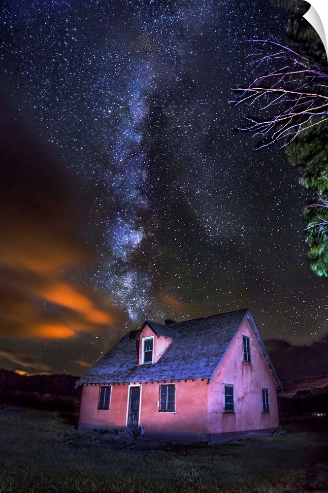 The Milky Way over the historic Mormon Row home in north Jackson, Wyoming.