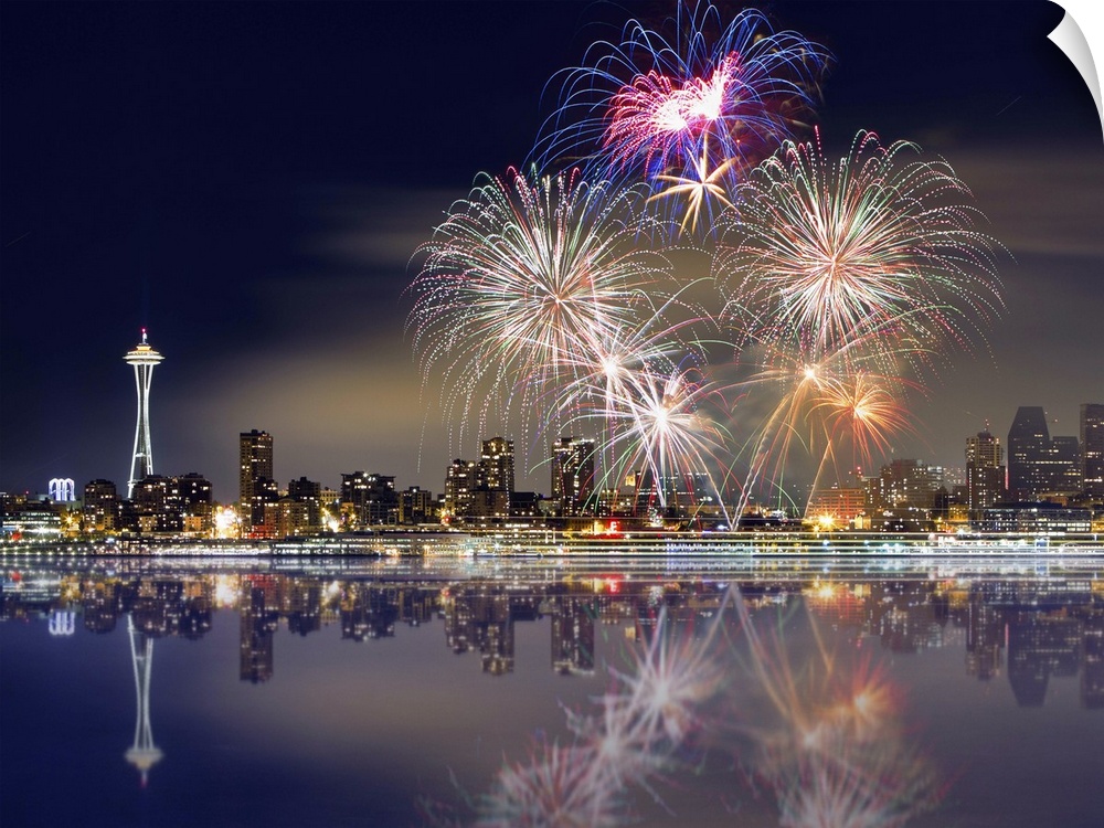 Fireworks and Seattle skyline with reflections.