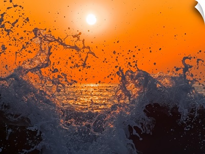 Sunset and Splashing Wave
