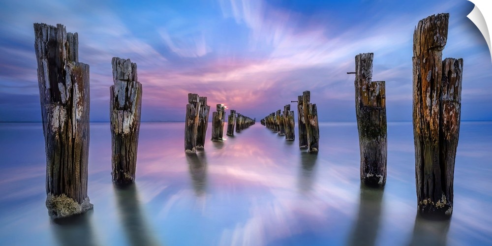 Old wooden posts in the ocean, Clifton Springs in Victoria, Australia.