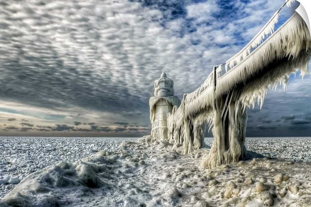 A pier completely frosted over with ice in the winter, Saint Joseph, Michigan.