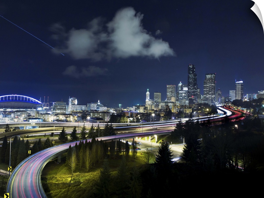 Light trails flowing into the city of Seattle, Washington, in the evening.