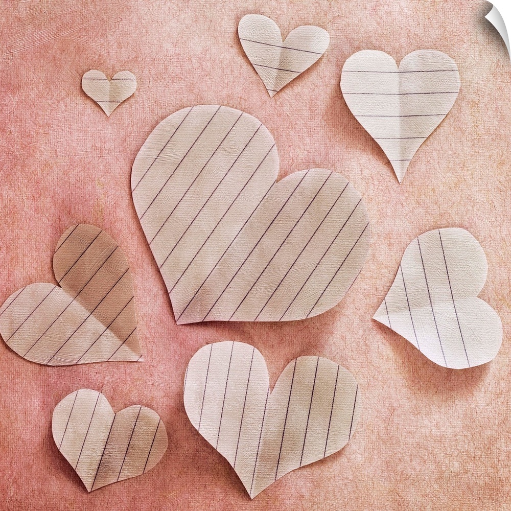 Hearts, cut out of paper, arranged as a still life