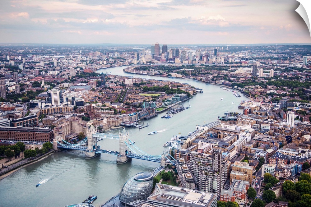 Aerial view of River Thames and Tower Bridge in London, England.