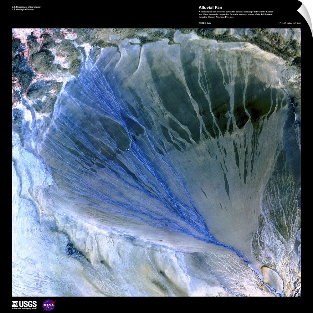 A vast alluvial fan blossoms across the desolate landscape between the Kunlun and Altun mountain ranges that form the sout...