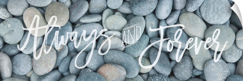 "Always and Forever" handwritten in flowing script over an image of smooth round pebbles.