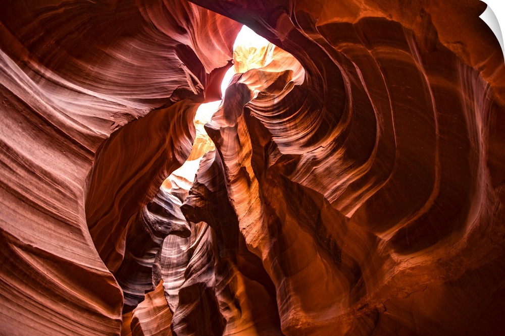 Photograph from inside of Antelope Canyon rock formation located on the Navajo Reservation in Page, Arizona with flowing p...