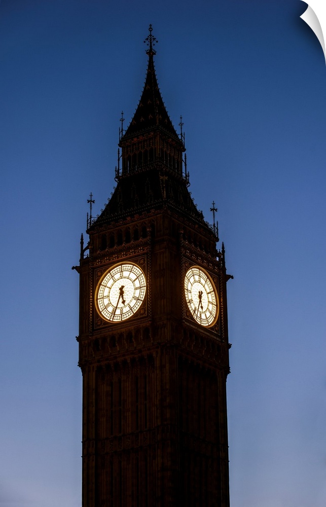 View of a famous clock tower called Big Ben in London, England at night.