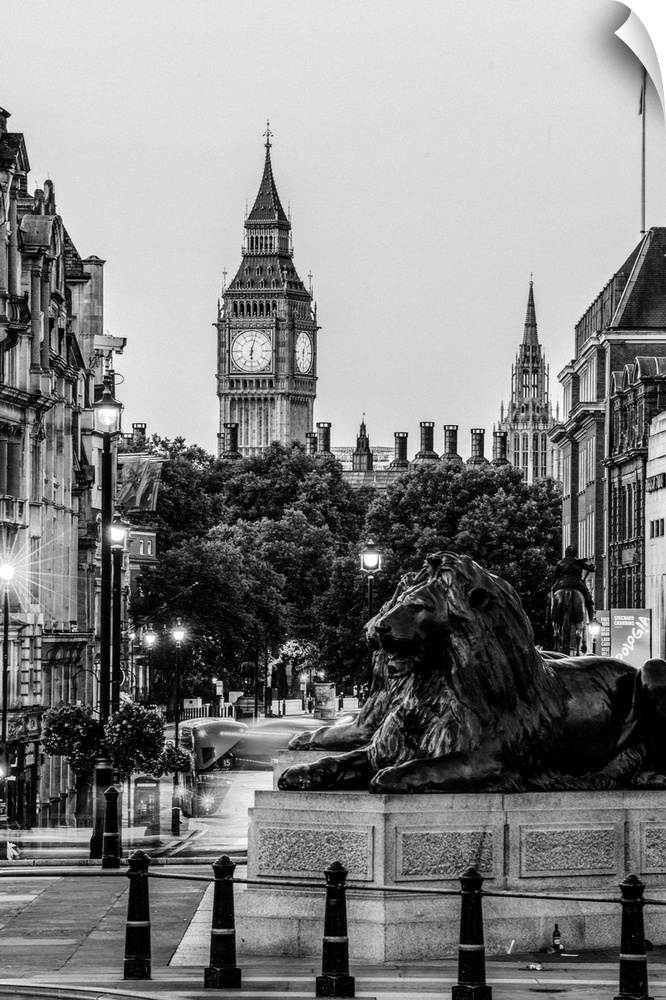 Black and white photograph of Trafalgar Square with the iconic Trafalgar Lions in the foreground and Big Ben in the backgr...