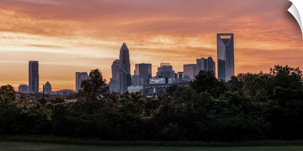 The sun setting on the largest city in North Carolina.