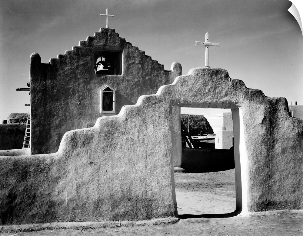 Church, Taos Pueblo, New Mexico, 1941, full side view of entrance with gate to the right.