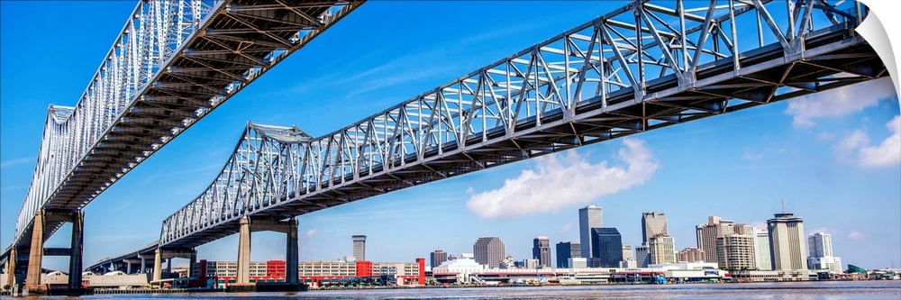 Panoramic photograph of the Crescent City Connection, formerly the Greater New Orleans Bridge, twin cantilever bridges tha...