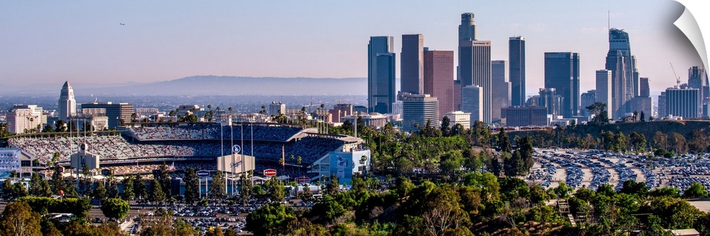 Panoramic photograph of the downtown Los Angeles skyline with Dodger Stadium on the left.