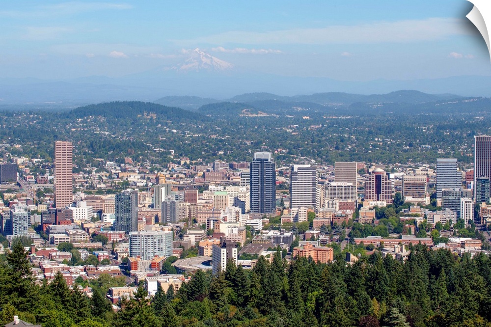 View of downtown Portland city skyline with hazy view of Mount Hood in Oregon.