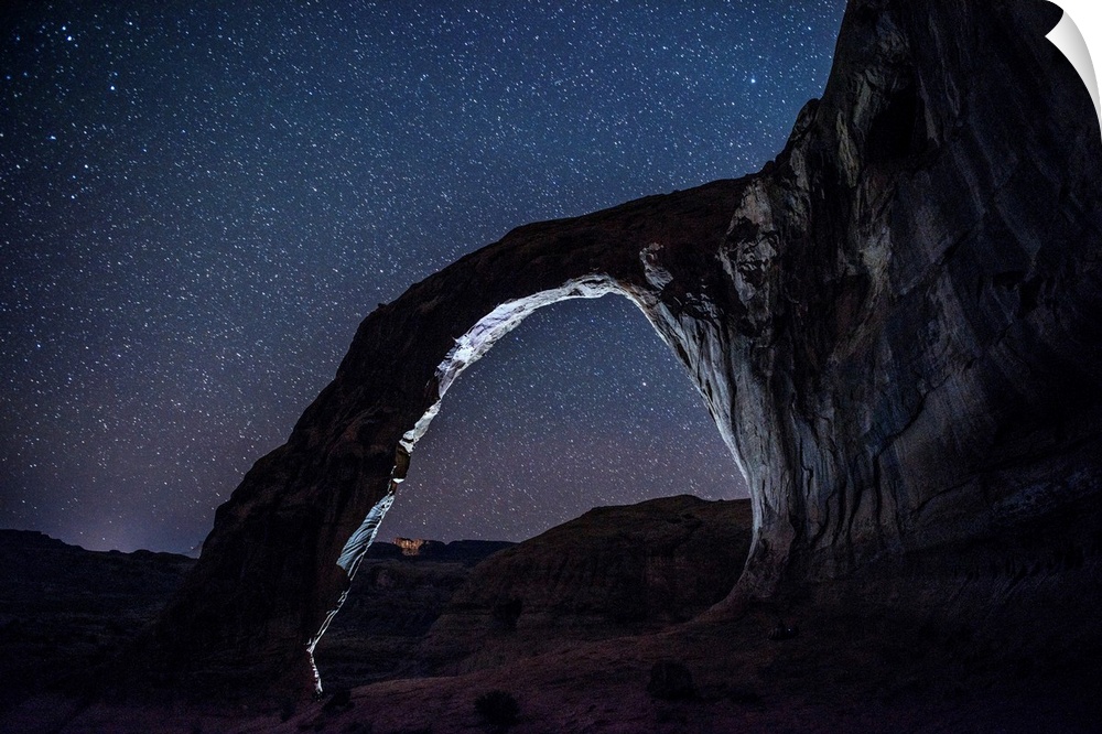 View of the east side of Corona Arch, also known as Little Rainbow Bridge, near Arches National Park in Utah.