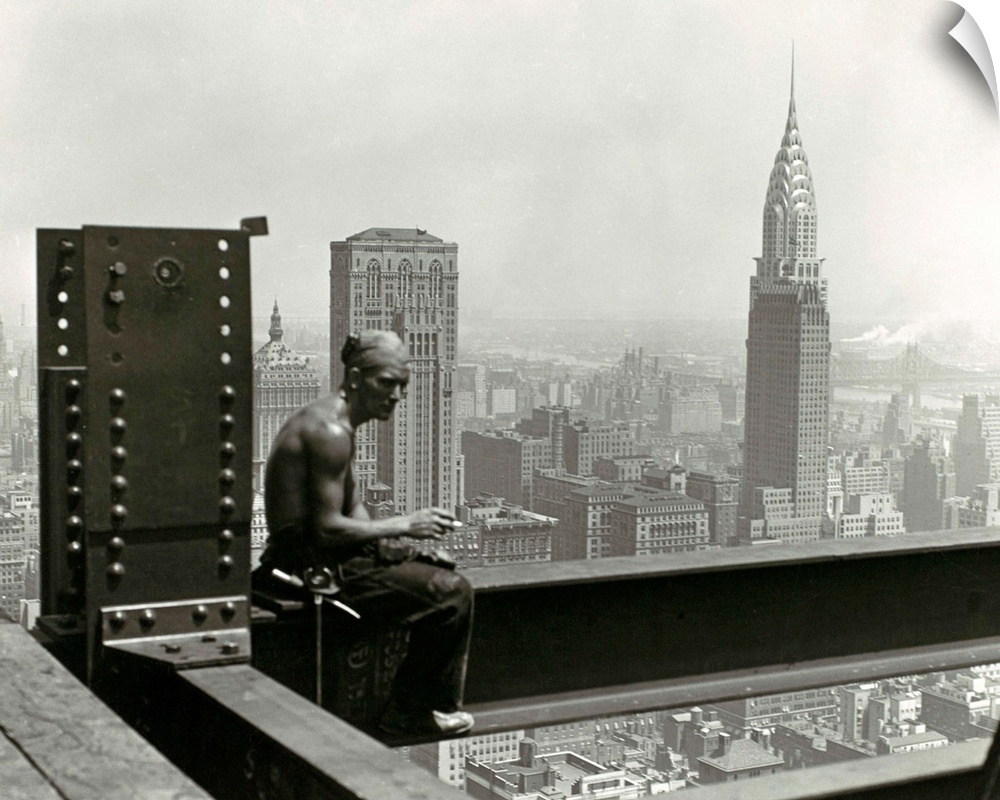 Hine took to great heights for this well-known photograph of a construction worker on the Empire State Building taking a b...