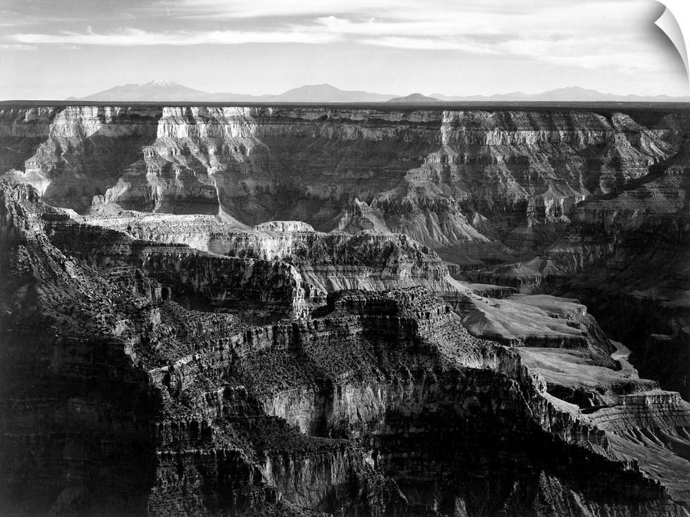 Grand Canyon National Park, broad panorama with detail of canyon, horizon, and mountains above.