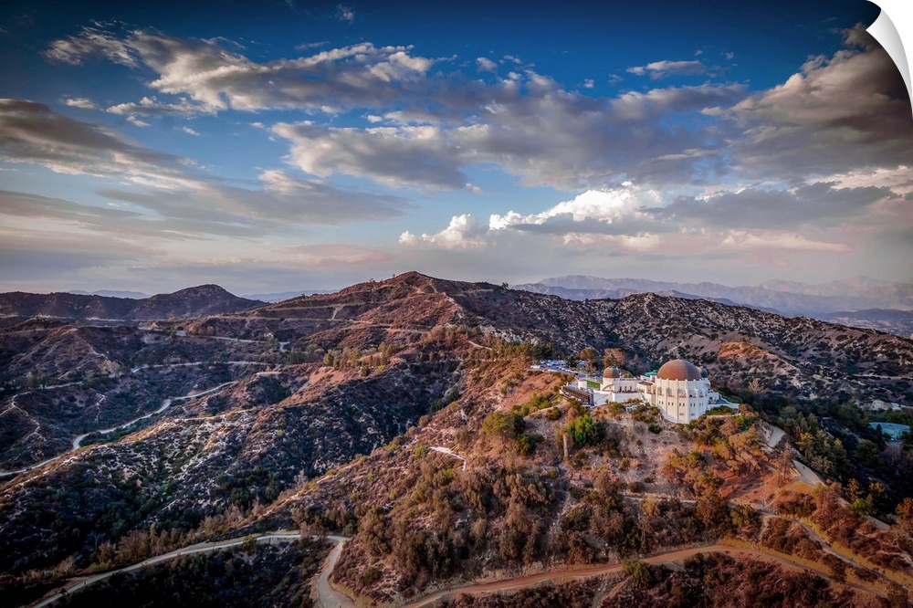 Aerial view of the Griffith Observatory on the hills outside of Los Angeles, California, at sunset.
