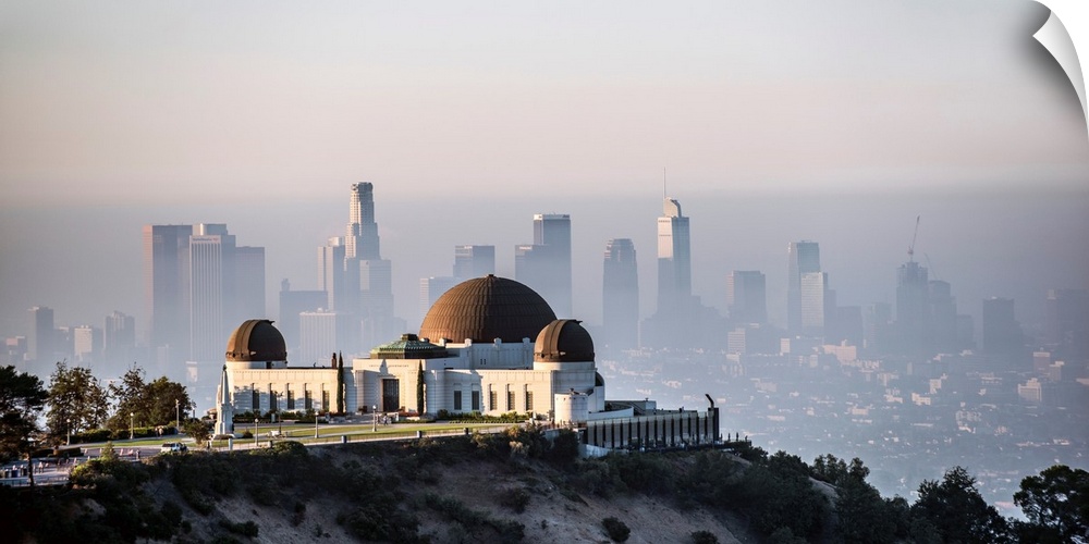 Elevated view of Griffith Observatory with downtown Los Angeles in the background, California.