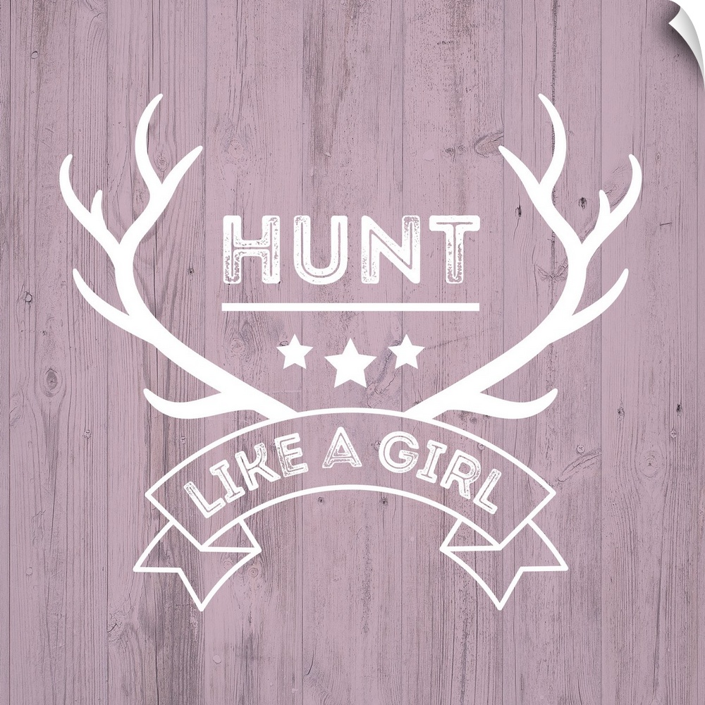 Deer antlers and a banner reading "Hunt Like A Girl" on a distressed pink wood background.