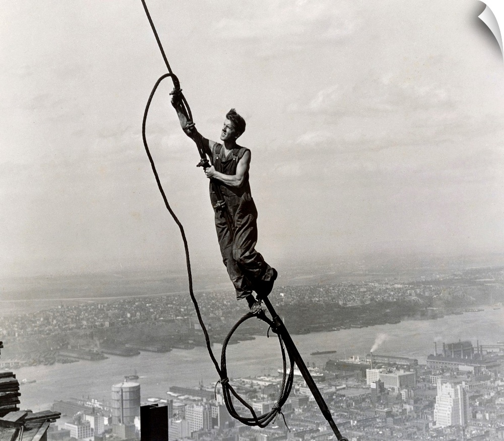 Of the many photographs Hine took of the Empire State Building, this one became the popular favorite. Suspended in gracefu...