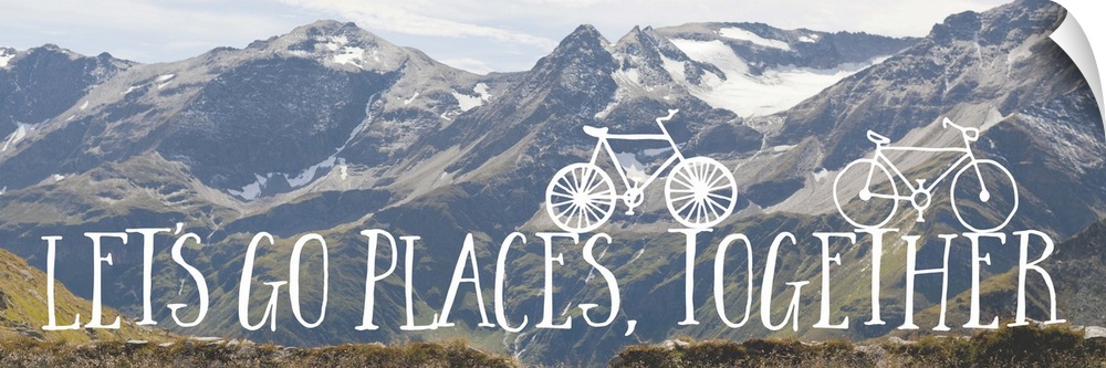 Handwritten sentiment with two small bicycles over an image of a snowy mountain range.