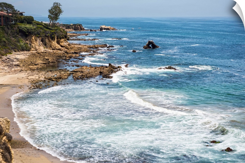 Little Corona del Mar beach is relatively small, flanked on both sides with rocky reefs.