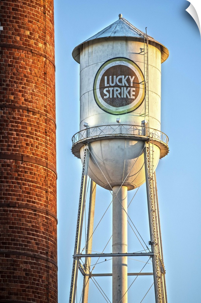 Lucky Strike Water Tower and Smokestack at sunset, American Tobacco Historic District, Durham, North Carolina.