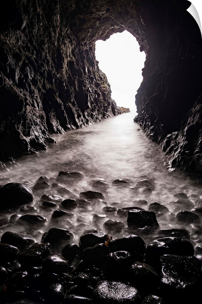 Photograph from inside Mermaid's Cave underneath Dunluce Castle in County Antrim, Ireland.