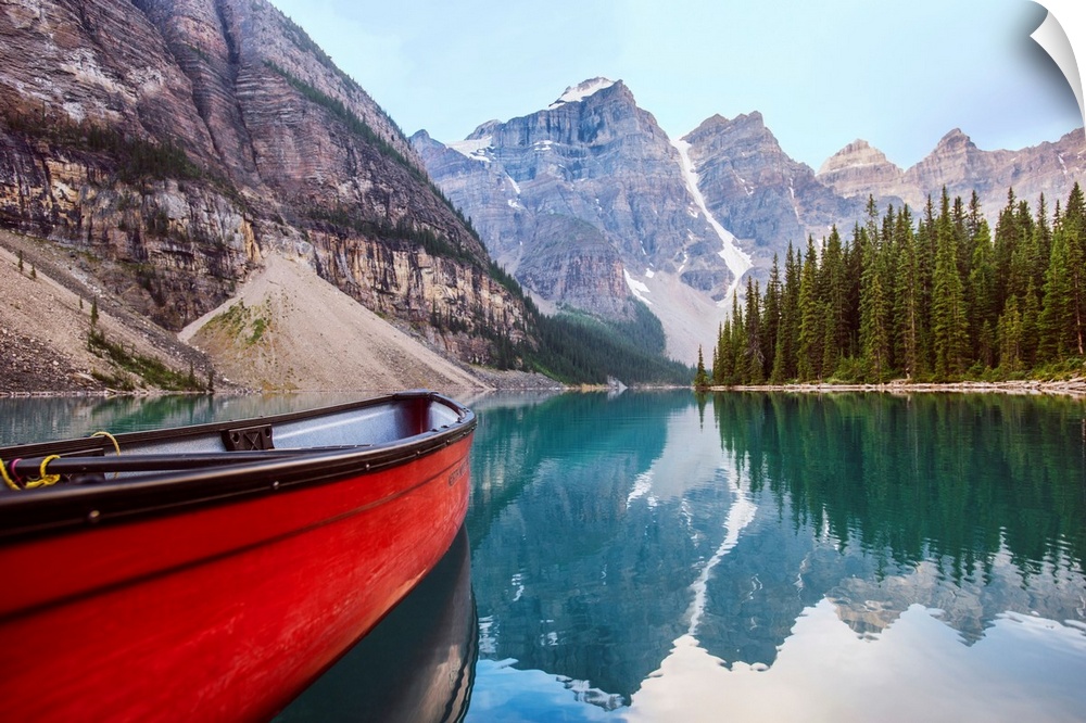 A red canoe on Moraine Lake in Banff National Park, Alberta, Canada.